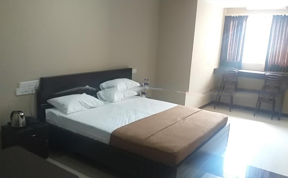 Hotel The Nisarga Grand à Bangalore Extérieur photo