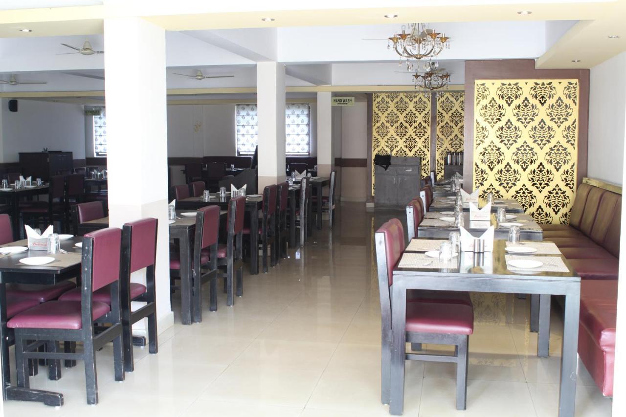 Hotel The Nisarga Grand à Bangalore Extérieur photo